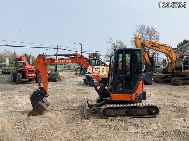 D'occasion Hitachi EX120 12t Pelle hydraulique avec la rotation du bois de  la pince de racleur métallique Graber chargeur / LG le grappin à Anhui,  Chine