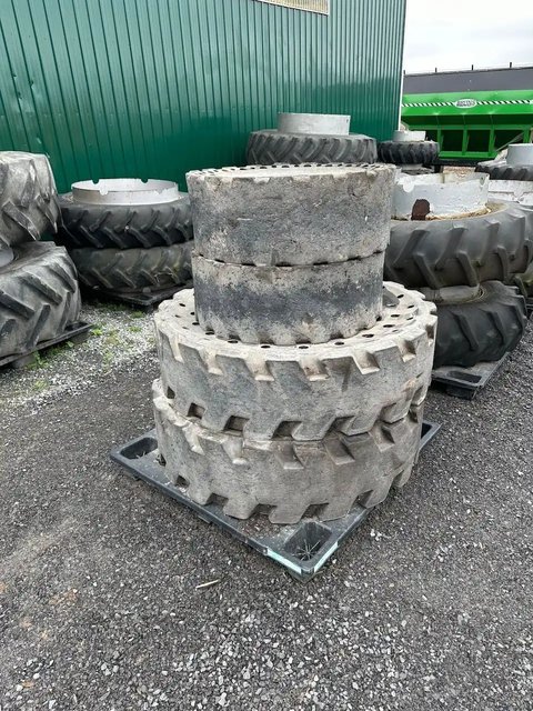 Main image for Used 2011 John Deere Solid Rubber Tires For Backhoe Tires & Rims
