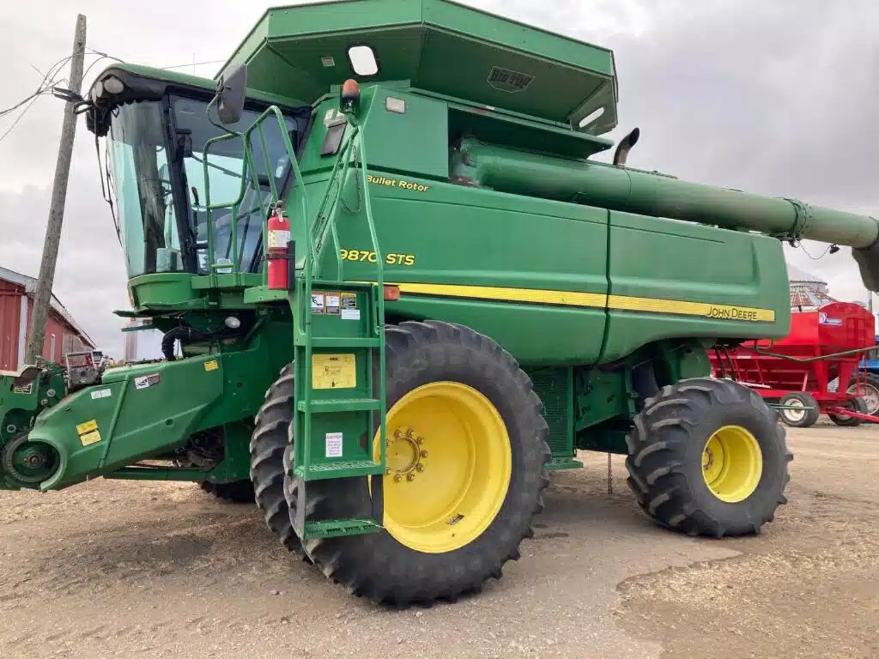 2010 John Deere 9870 Batteuse