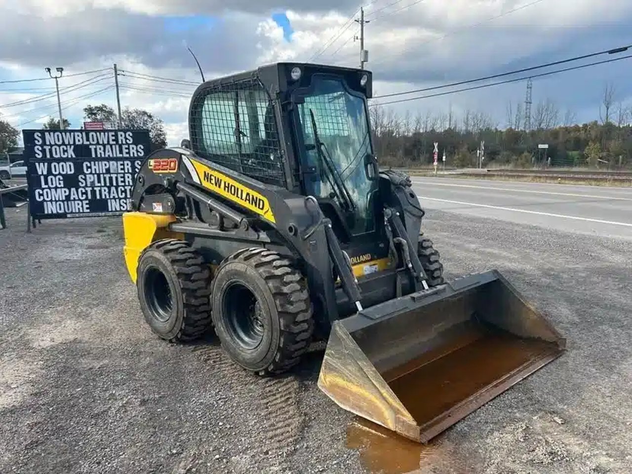 2013 New Holland L220 chargeuse à direction à glissement
