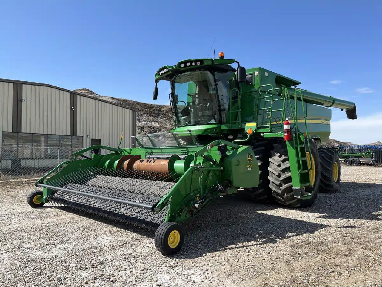 2013 John Deere S690 Batteuse
