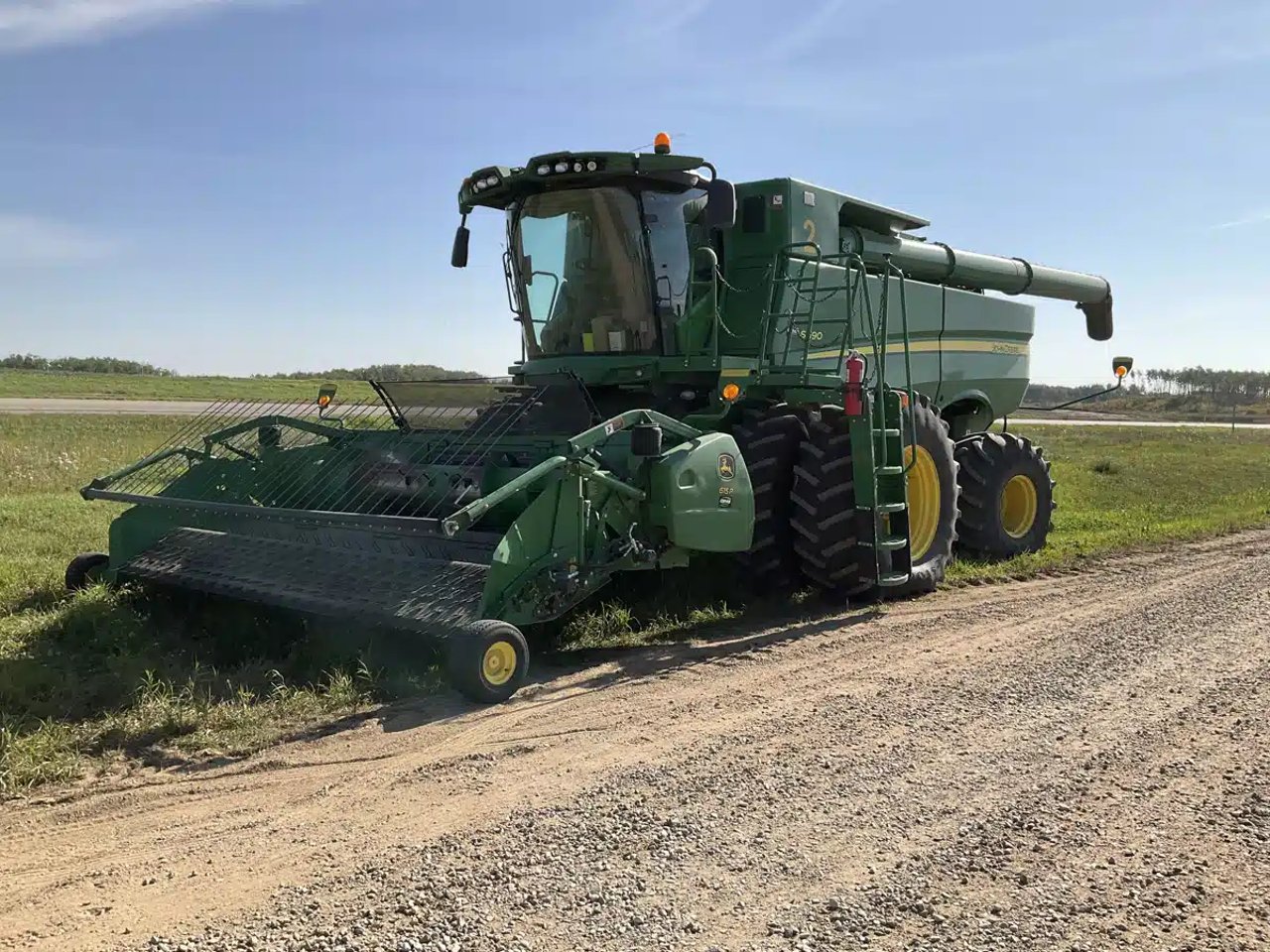 2015 John Deere S690 Batteuse