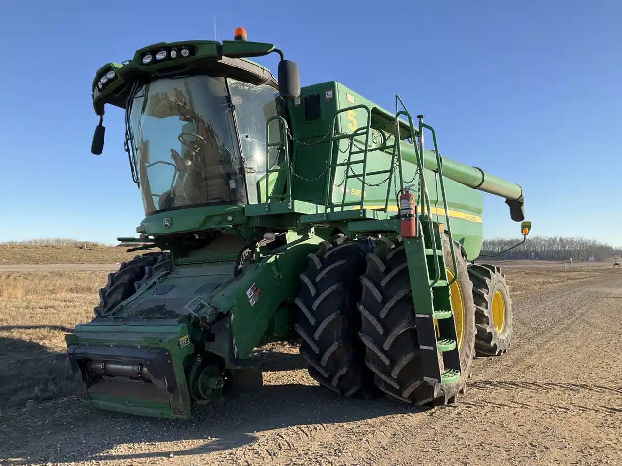 2015 John Deere S690 Batteuse