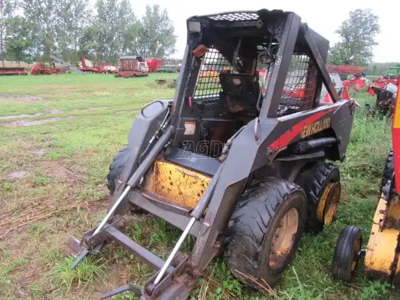 New Holland LS170 chargeuse à direction à glissement