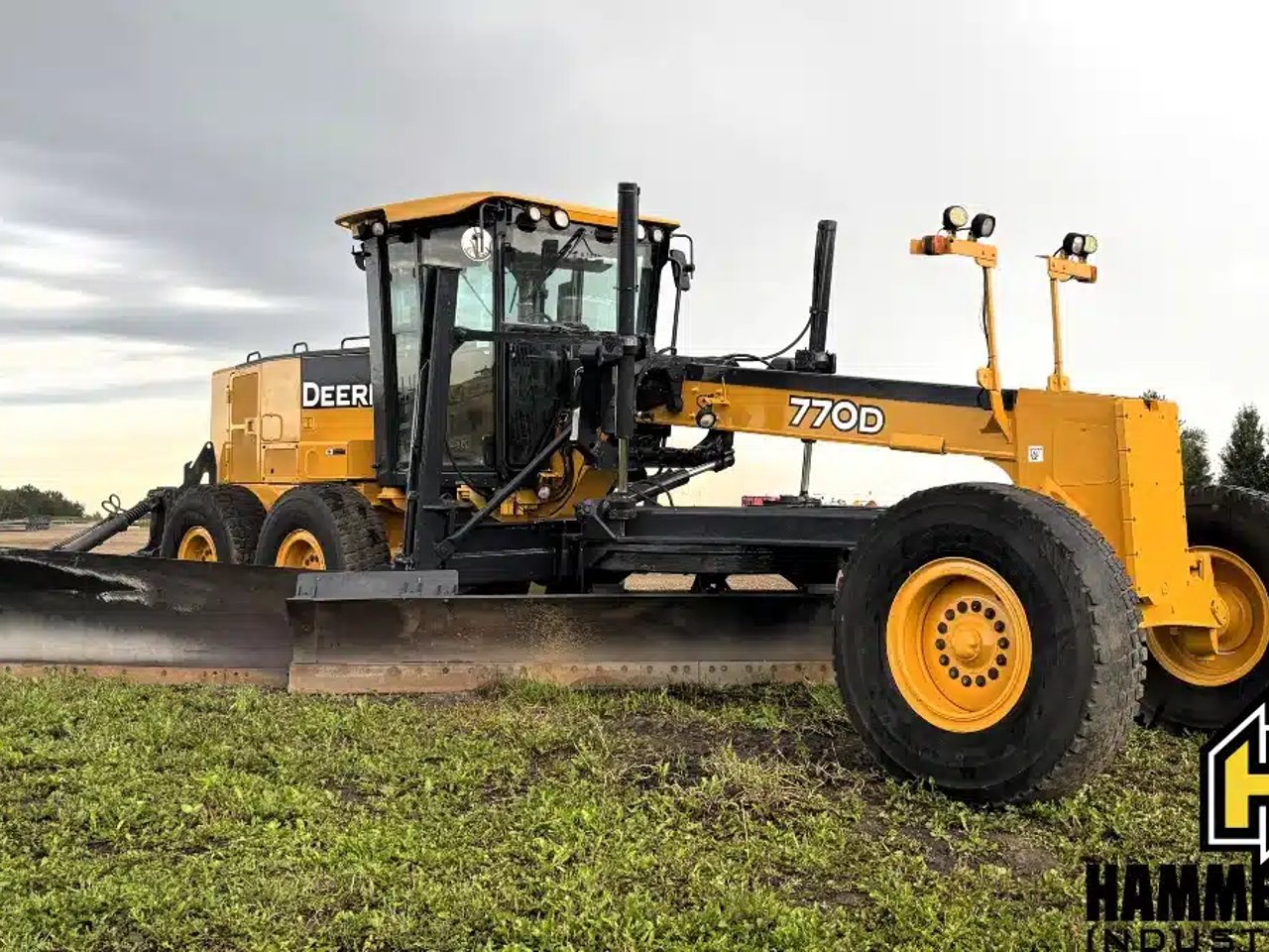2006 John Deere 770D Niveleuse (Gratte panier)