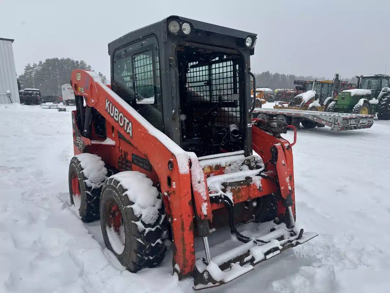 2015 Kubota SSV75 chargeuse à direction à glissement