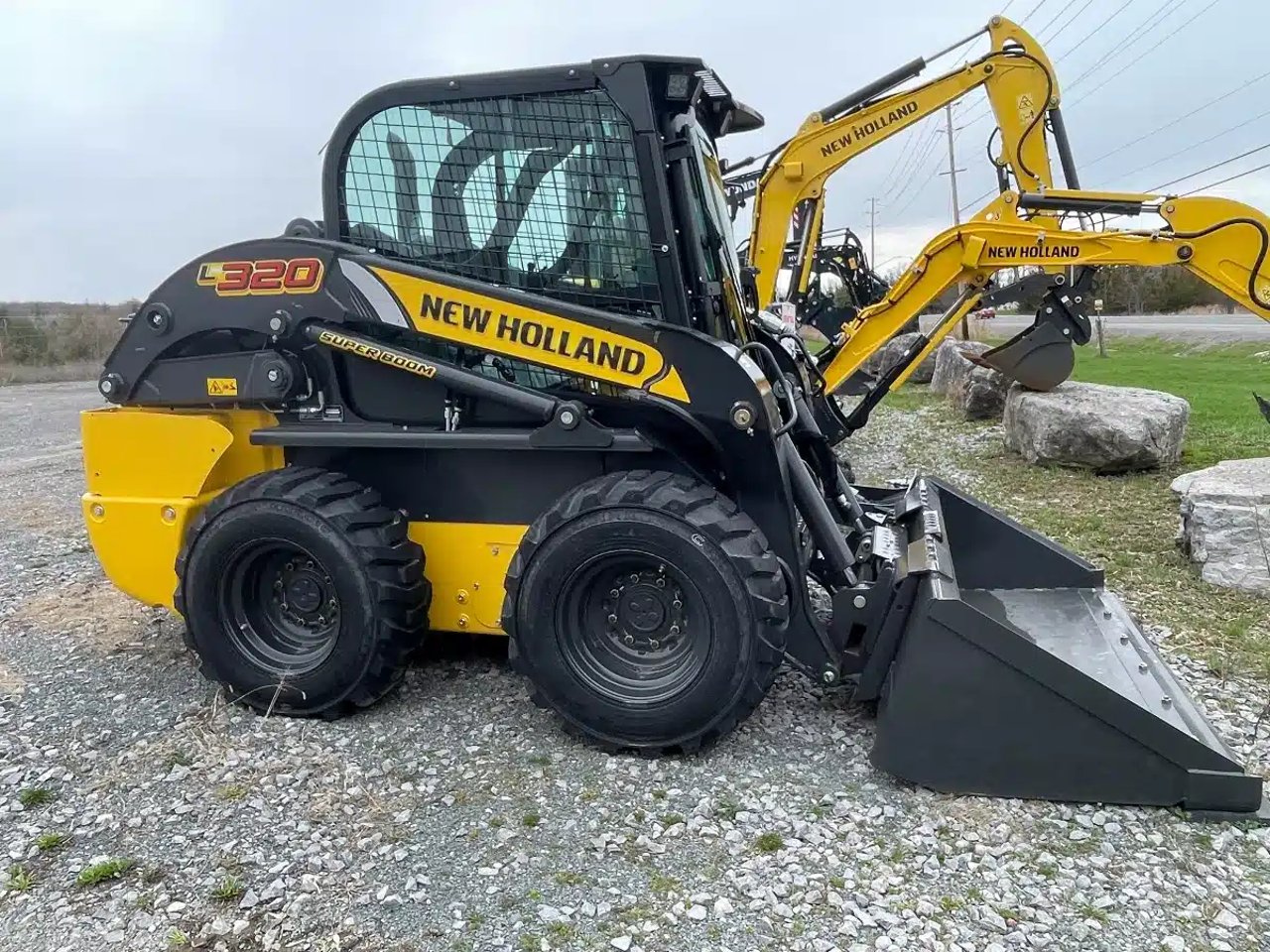2025 New Holland Construction L320 chargeuse à direction à glissement