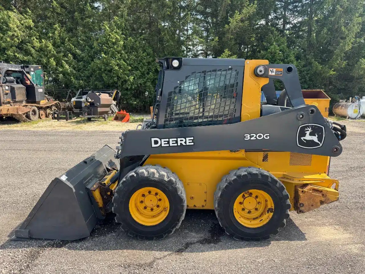 2023 John Deere 320G chargeuse à direction à glissement