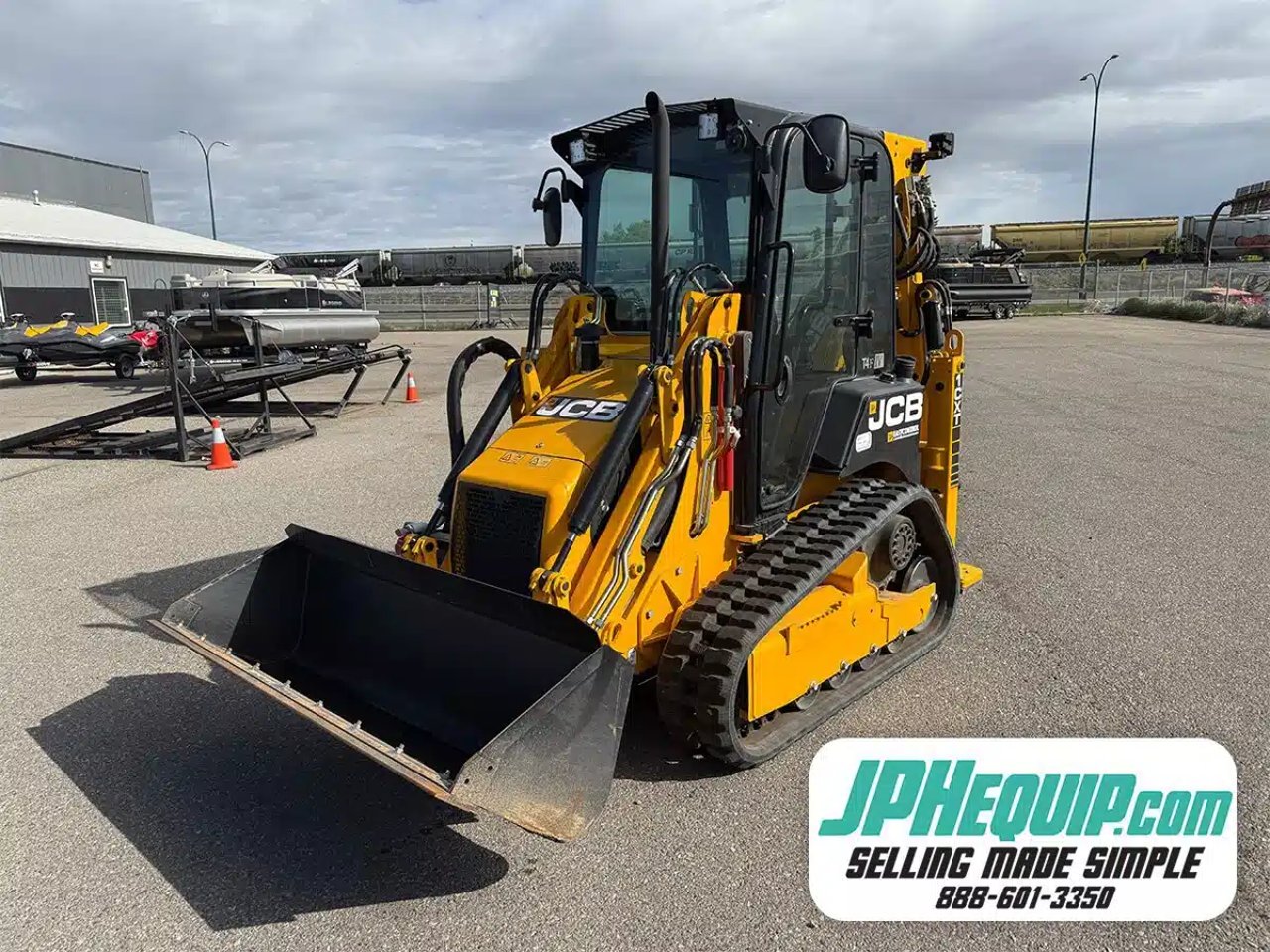 2022 JCB 1CXT chargeuse à direction à glissement