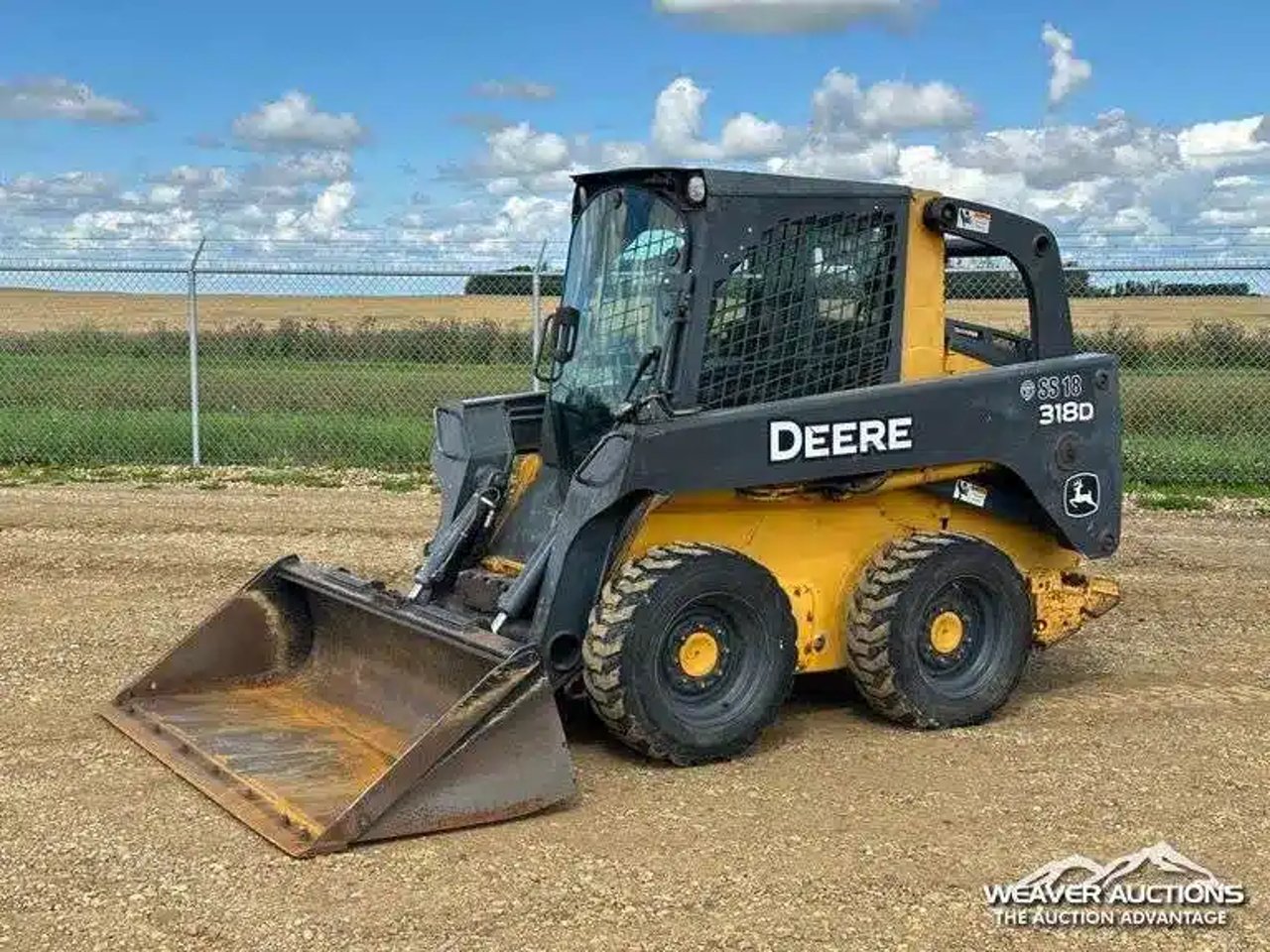 2012 John Deere 318D chargeuse à direction à glissement