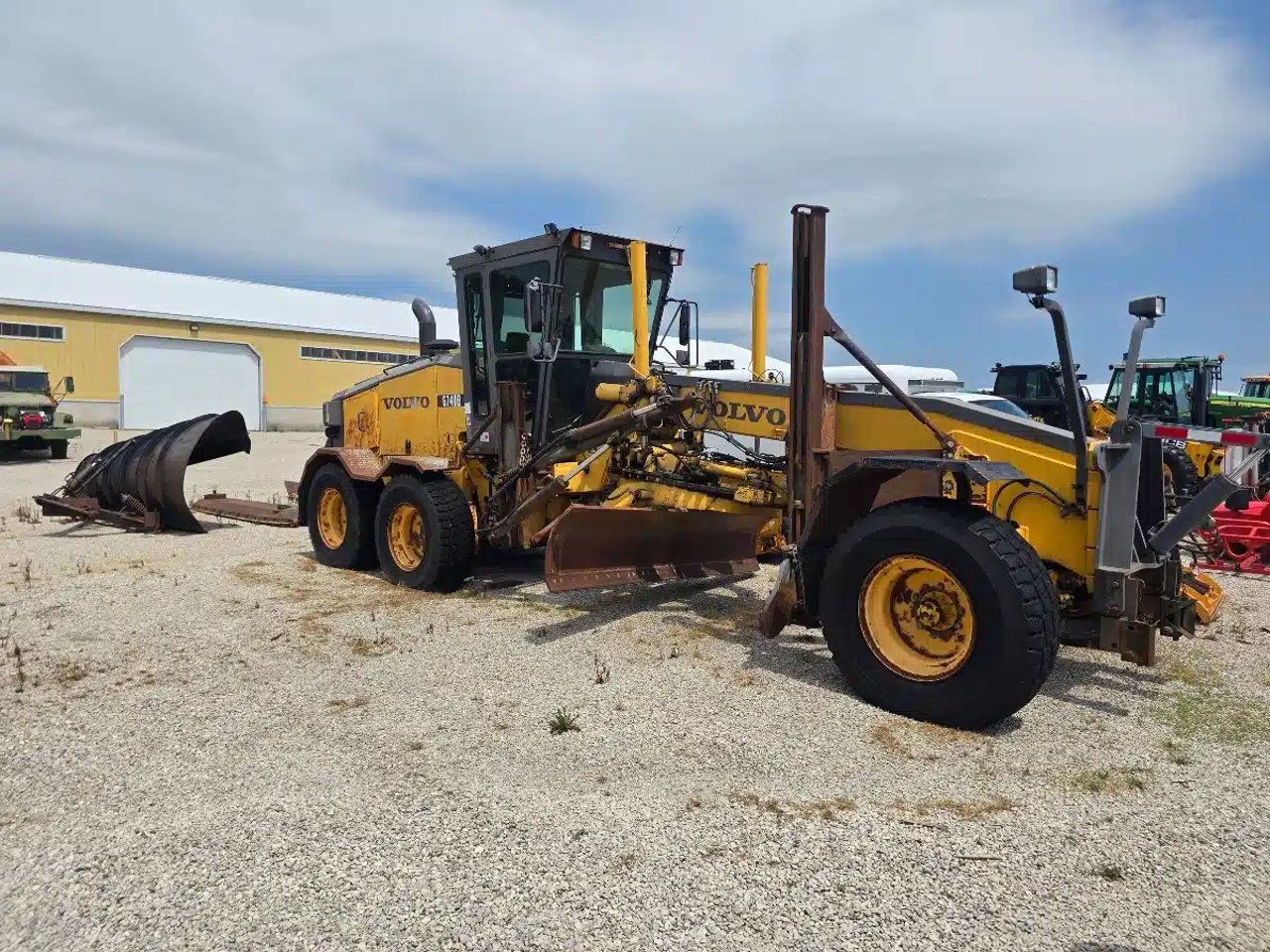 Volvo G740B Niveleuse (Gratte panier)
