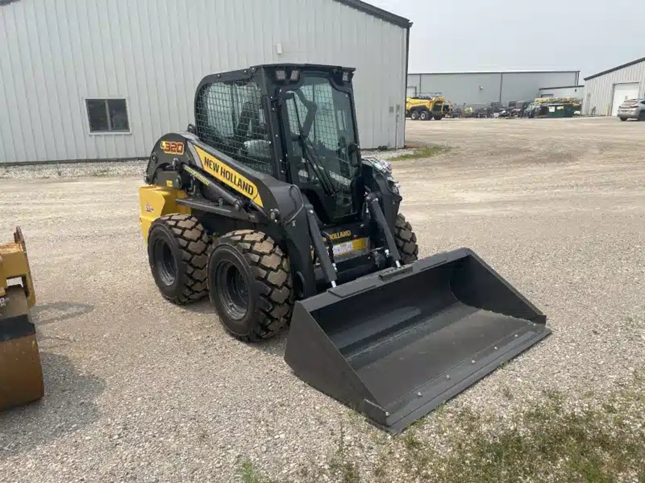 2026 New Holland L320 RG-NA chargeuse à direction à glissement