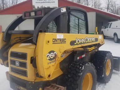 John Deere 260 chargeuse à direction à glissement — photo 2