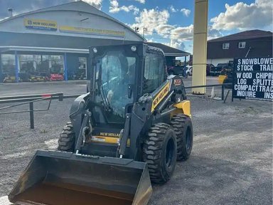 2013 New Holland L220 chargeuse à direction à glissement — photo 2