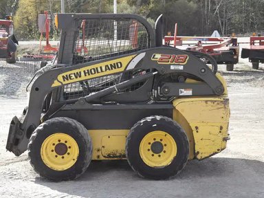 New Holland Construction L218 chargeuse à direction à glissement — photo 2