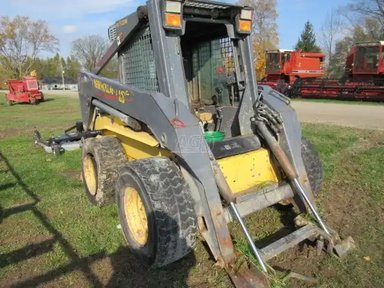 2001 New Holland LS180 chargeuse à direction à glissement — photo 2