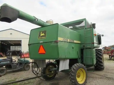 John Deere 7720 Batteuse — photo 2