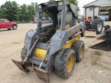 2000 New Holland LS150 chargeuse à direction à glissement — photo 2