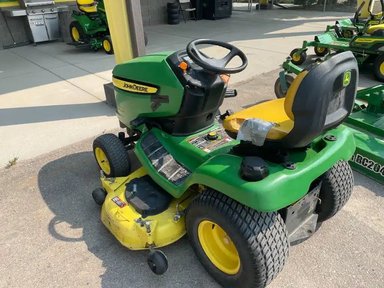 2012 John Deere X320 Tracteur à pelouse — photo 2