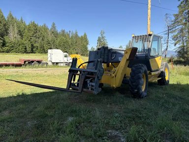 2000 New Holland LM860 Chargeur télescopique — photo 2