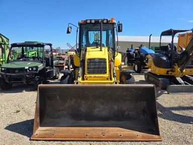 New Holland B95 Rétrocaveuse — photo 2