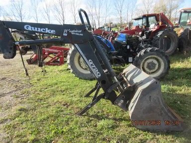 2002 Quicke Q720 chargeur frontal — photo 2