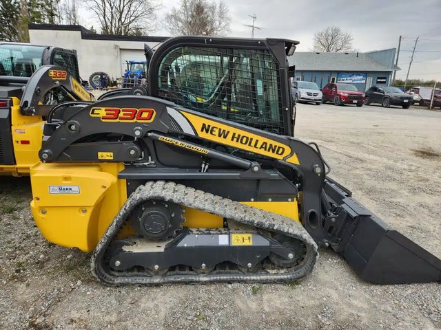 New Holland C330 Chargeur sur chenilles