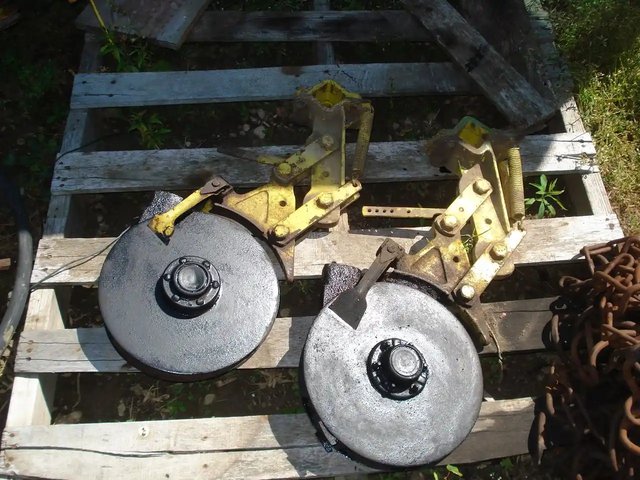 John Deere Disc Openers pièces - neuves et usagées