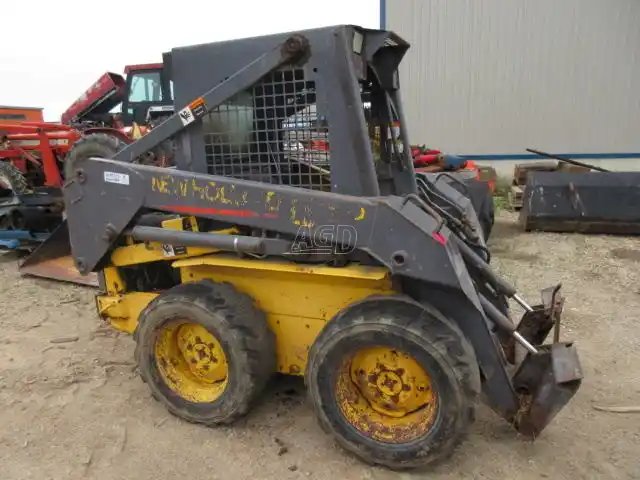 2000 New Holland LS150 chargeuse à direction à glissement