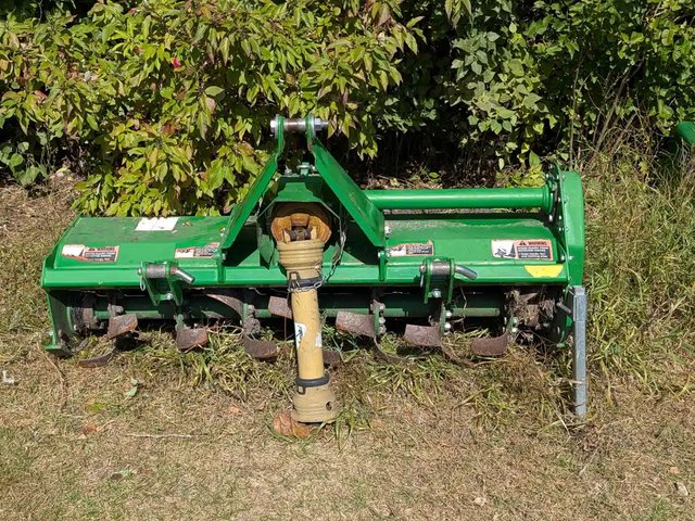 2014 John Deere 655 houe rotative