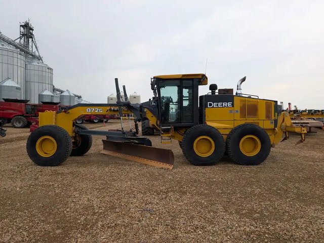 2012 DEERE 872G Niveleuse (Gratte panier)