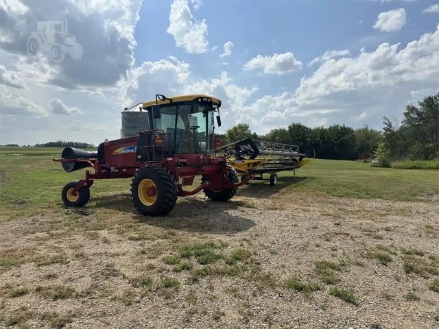 2009 New Holland H8040 Andaineur