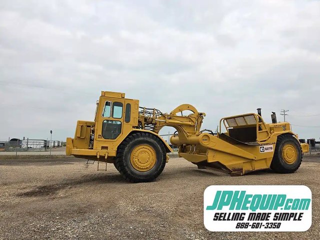 1985 Caterpillar 627 Gratte - Trainée