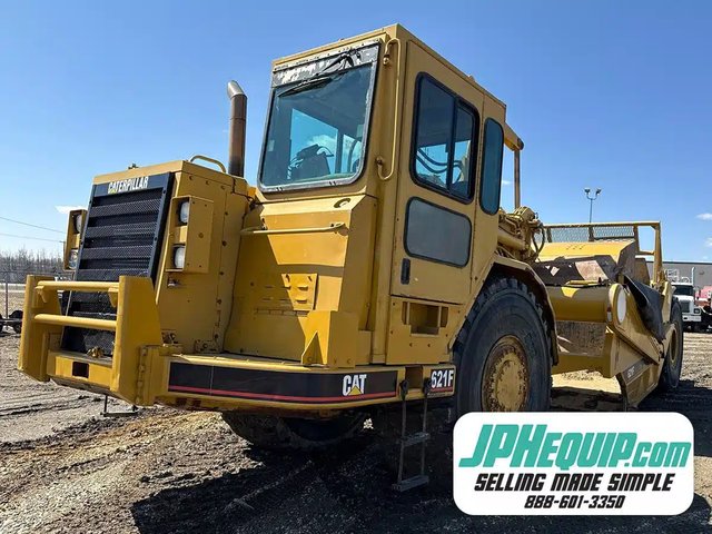 1999 Caterpillar 621 Gratte