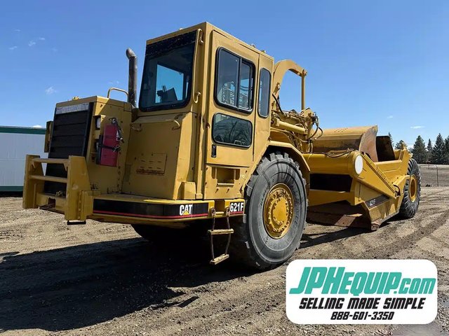 1999 Caterpillar 621 Gratte
