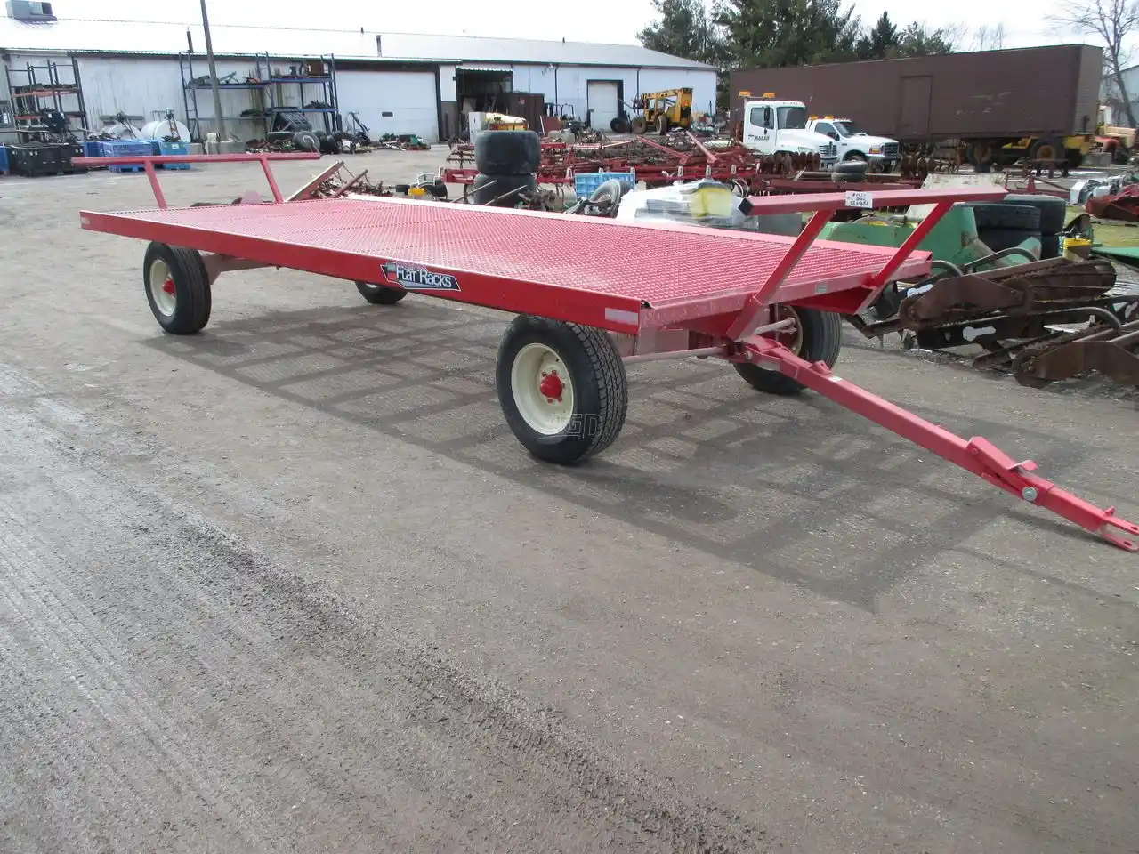 Gallery image 1 for New John BM Mfg Ltd. FLAT RACK Bale Wagon