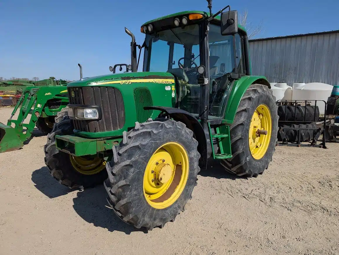 Photo de la Galerie 1 pour John Deere 6420 Tracteur