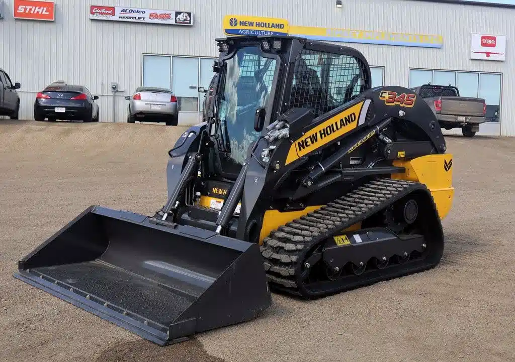 Photo de la Galerie 1 pour 2026 New Holland Construction C345 chargeuse à direction à glissement