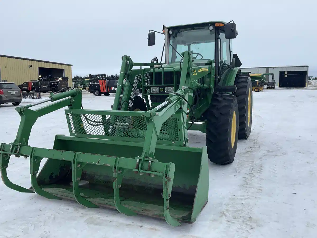 2012 John Deere 6115D Tractor