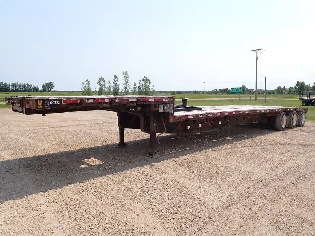 Photo de la Galerie 1 pour 2003 Manac 53FT Tridem OFF ROAD remorque - step deck