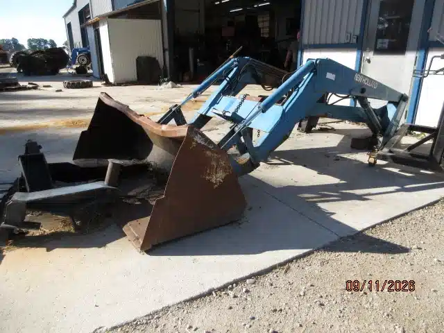 Photo de la Galerie 1 pour New Holland 7411 chargeur frontal
